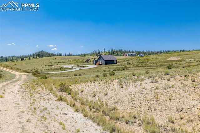 exterior space with a rural view