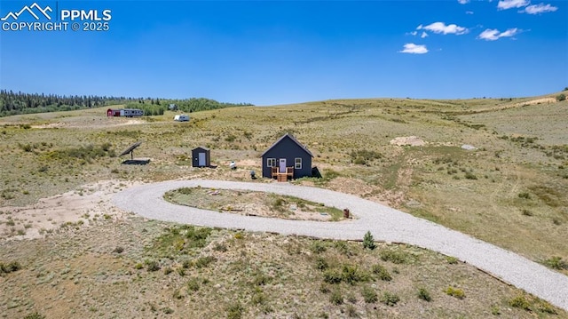 drone / aerial view with a rural view