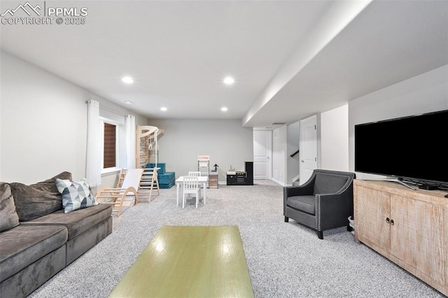 carpeted living area featuring recessed lighting