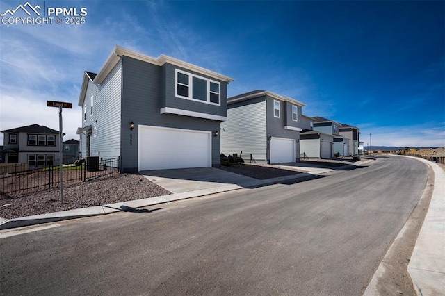 6395 Laud Pt, Colorado Springs, CO 80924 - view of front facade with a garage and driveway