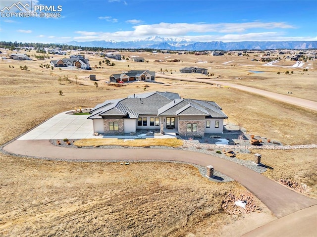 drone / aerial view with a mountain view