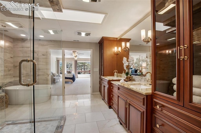 full bathroom featuring a shower stall, a ceiling fan, connected bathroom, and vanity