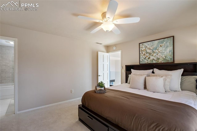 bedroom with ceiling fan, connected bathroom, light carpet, visible vents, and baseboards