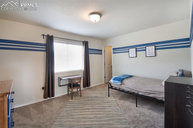 carpeted bedroom with baseboards