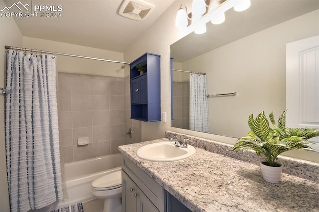 full bath with visible vents, toilet, vanity, and shower / bath combo