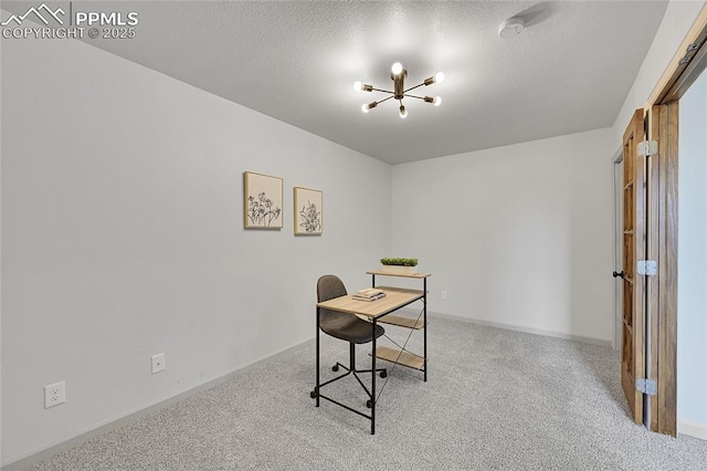 carpeted home office featuring a textured ceiling, a chandelier, and baseboards