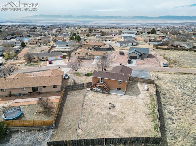 aerial view with a mountain view and a residential view