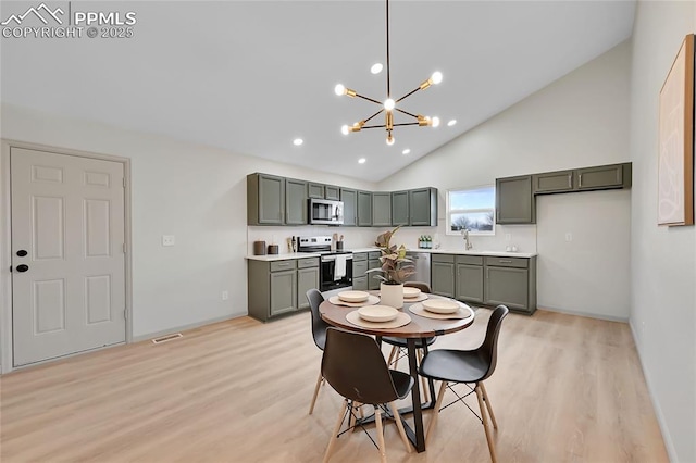 dining room featuring high vaulted ceiling, recessed lighting, visible vents, a chandelier, and light wood-type flooring