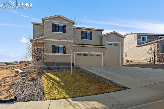 view of front of house featuring driveway and a front yard