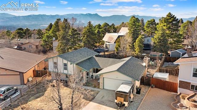 aerial view with a residential view and a mountain view