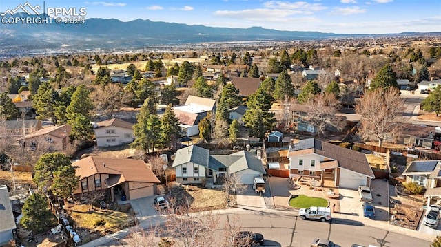 drone / aerial view with a residential view and a mountain view