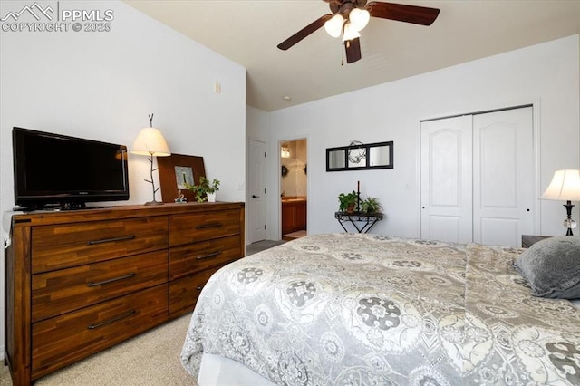 bedroom featuring a closet, light colored carpet, and ceiling fan