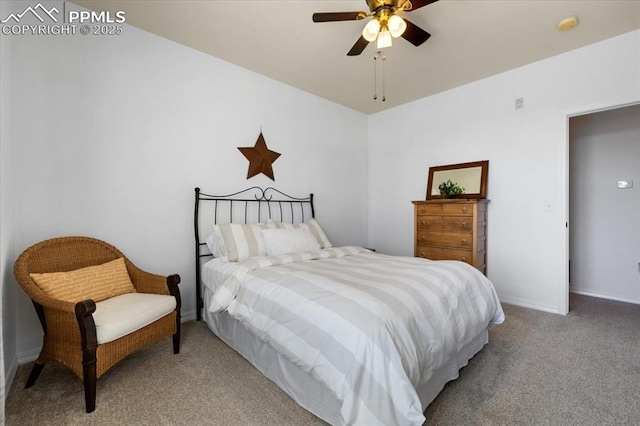 bedroom with ceiling fan, carpet, and baseboards