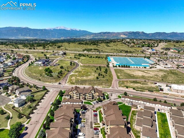 bird's eye view with a mountain view