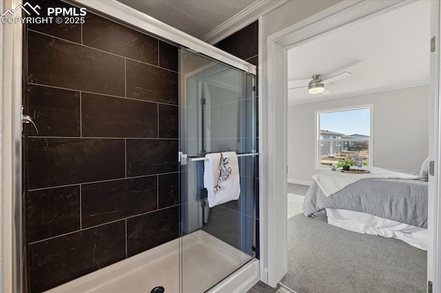 bathroom featuring ensuite bathroom, ceiling fan, a stall shower, and crown molding