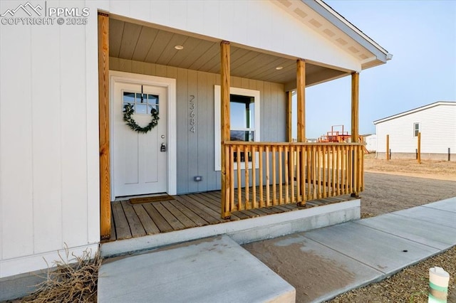 entrance to property with covered porch