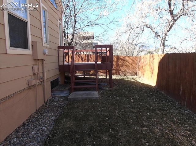 view of yard with a fenced backyard