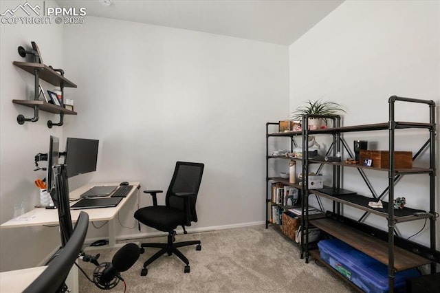 office space with carpet and baseboards