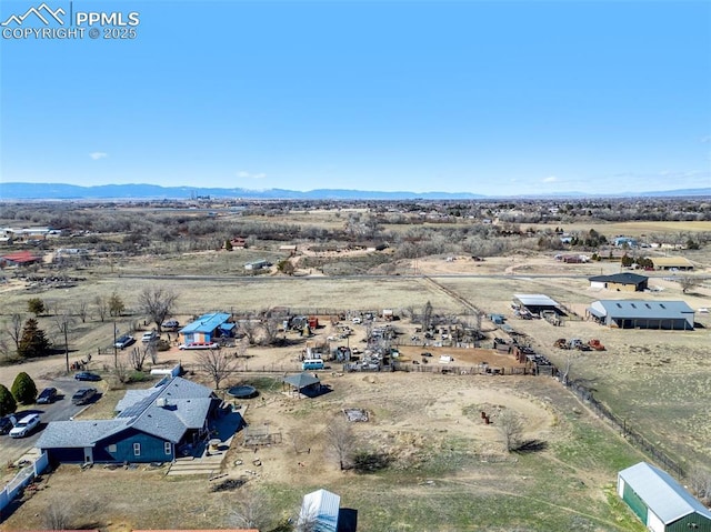 bird's eye view with a rural view and a mountain view