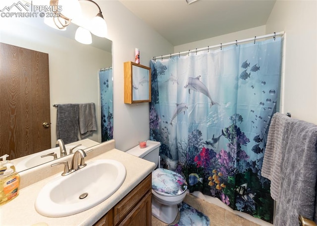 bathroom with toilet, tile patterned flooring, vanity, and a shower with curtain