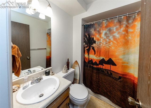 997 Magnolia St, Colorado Springs, CO 80907 - full bath featuring vanity, curtained shower, and toilet