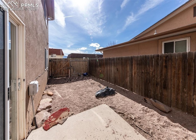 997 Magnolia St, Colorado Springs, CO 80907 - view of yard featuring a patio area and a fenced backyard
