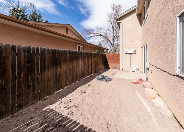 997 Magnolia St, Colorado Springs, CO 80907 - view of yard featuring a patio and fence