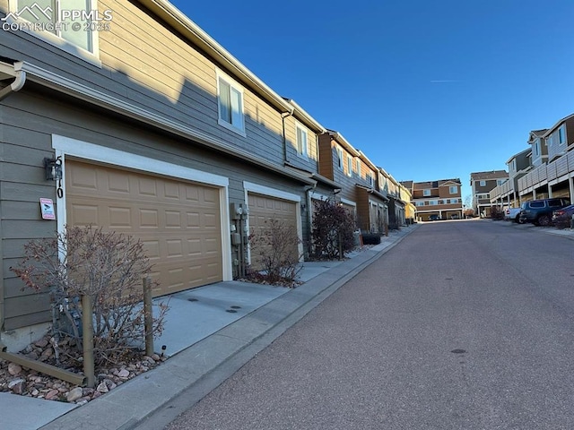 view of road with a residential view