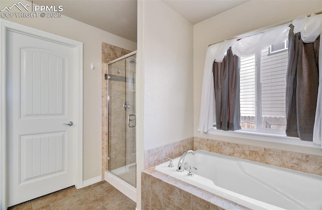 full bathroom with a garden tub, a shower stall, and visible vents