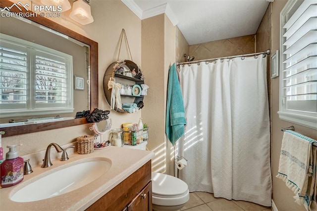 bathroom featuring toilet, ornamental molding, tile patterned floors, curtained shower, and vanity