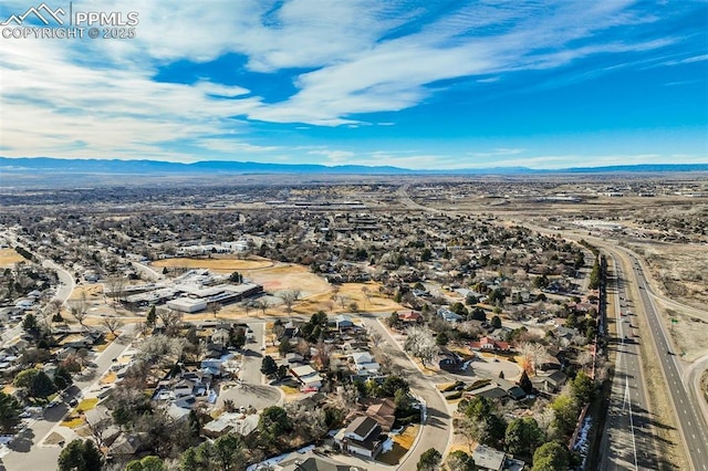 aerial view with a residential view and a mountain view