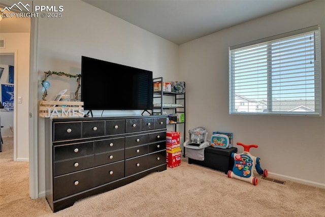 rec room featuring carpet flooring, visible vents, and baseboards