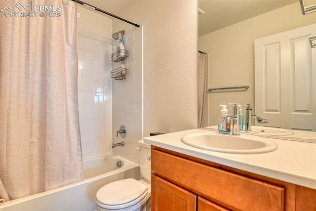 full bath featuring toilet, a textured wall, shower / bath combination with curtain, and vanity