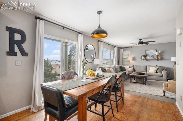 1432 Red Mica Way, Monument, CO 80132 - dining room featuring ceiling fan, light wood-style flooring, and baseboards