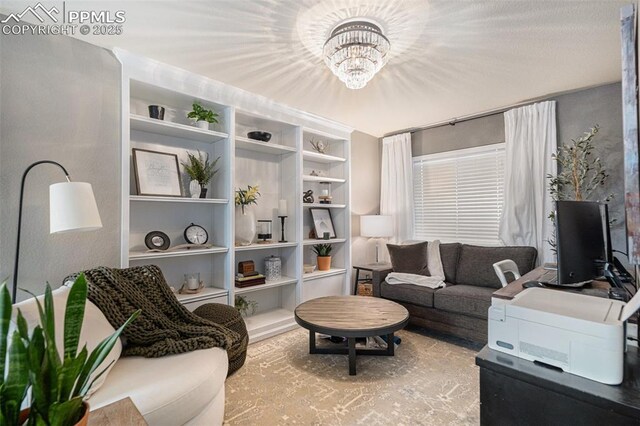 1432 Red Mica Way, Monument, CO 80132 - living area featuring a notable chandelier