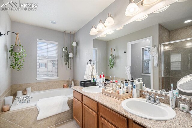 1432 Red Mica Way, Monument, CO 80132 - full bath featuring double vanity, a garden tub, a shower stall, and a sink