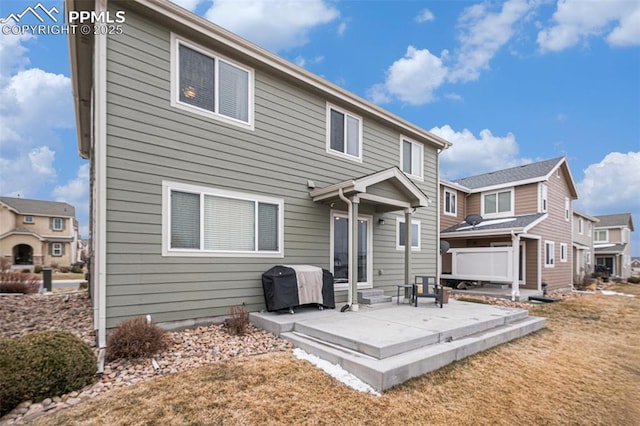 1432 Red Mica Way, Monument, CO 80132 - back of house with a yard, a residential view, and a patio
