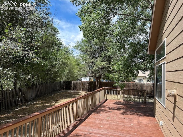 815 Riverview Ln, Colorado Springs, CO 80916 - deck with a fenced backyard