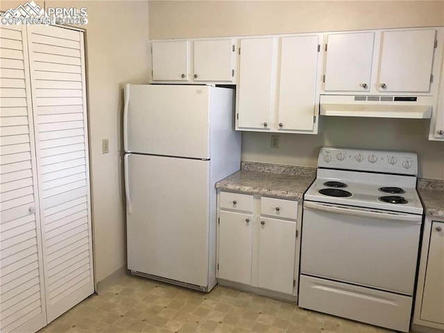 kitchen with light countertops, white appliances, white cabinets, and under cabinet range hood