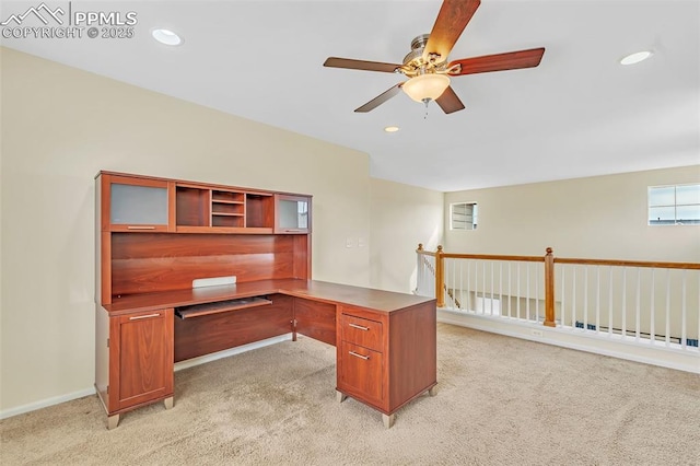 unfurnished office featuring baseboards, recessed lighting, a ceiling fan, and light colored carpet