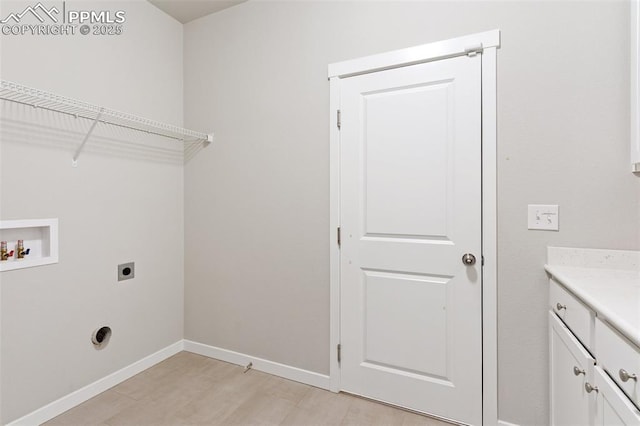 laundry room featuring cabinet space, baseboards, light wood-style flooring, washer hookup, and electric dryer hookup