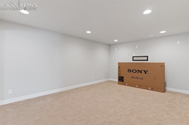 basement with baseboards, carpet flooring, and recessed lighting