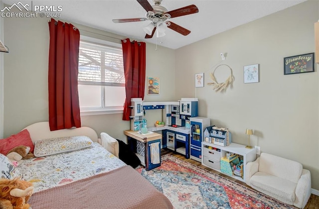 bedroom featuring a ceiling fan