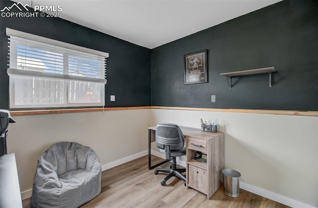 office with baseboards and wood finished floors