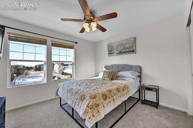 bedroom featuring carpet floors, ceiling fan, and baseboards