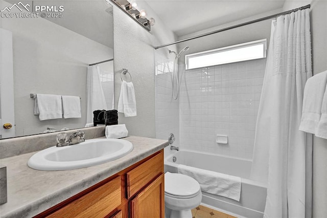 full bath featuring vanity, toilet, and shower / bath combo with shower curtain