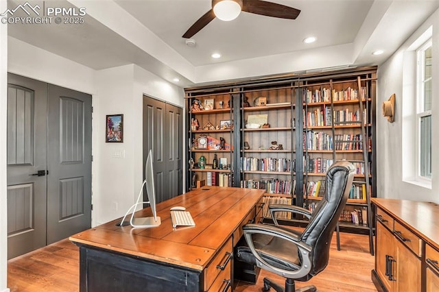 office space featuring ceiling fan, light wood-type flooring, and recessed lighting