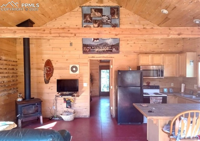 kitchen with electric range, stainless steel microwave, freestanding refrigerator, wood ceiling, and tile counters