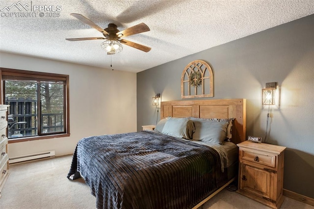 bedroom with a ceiling fan, light carpet, a baseboard heating unit, and a textured ceiling