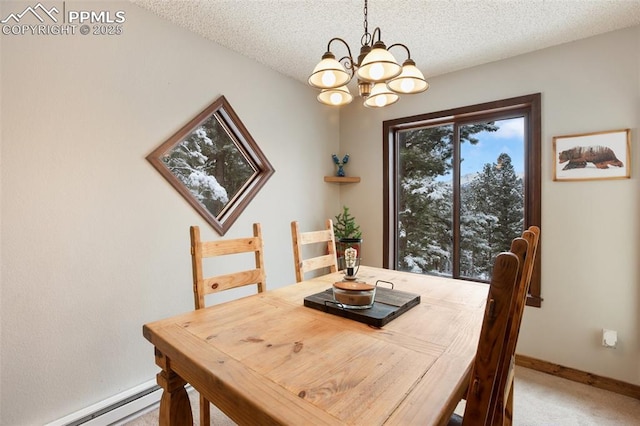 dining area with a notable chandelier, a textured ceiling, baseboards, and baseboard heating